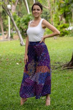 Breezy, comfortable and super easy to combine with your favorite tops.  What's not to love about these Thai Palazzo Pants? The fabric is printed with a mesmerising layered floral pattern which shimmer as the pants move. High-waisted and wide-legged they will suit most figures and are made to be worn as full length pants.  To make these pants more comfortable, elastic has been used on the rear of the waistband, giving you the chance to show off the top of the pants without the smoc Thai Pants, Fisherman Pants, Full Length Pants, Printed Palazzo Pants, Hippie Pants, Classic Pants, Palazzo Pants, Fashion Magazine, Super Easy