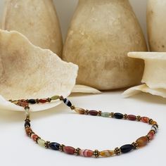 This necklace is even more beautiful in person! The detail and variances in color of the gemstone beading are really special and no two pieces of jewelry are the same. Banded agate and jade beads make up this 22-inch-long beaded necklace. The necklace has a s-hook closure. We will ship this jewelry with an information card. Designed and created by Museum Reproductions in the USA. For a matching bracelet visit this link: https://museumreproductions.etsy.com/listing/935740024 The extraordinary var Beaded Agate Crystal Necklaces With Round Beads, Agate Beaded Crystal Necklaces With Round Beads, Agate Beaded Crystal Necklaces, Multicolor Agate Crystal Necklace With Faceted Beads, Multicolor Agate Necklaces With Colorful Beads, Handmade Agate Beaded Necklaces With Round Beads, Multicolor Beaded Agate Necklaces, Multicolor Agate Beaded Necklaces, Hand-strung Czech Glass Beaded Necklaces For Jewelry Making