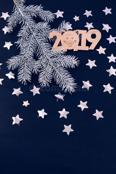 the new year is coming and it's time to celebrate with stars on blue background