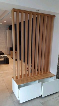 a wooden bench sitting in the middle of a living room