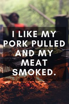 i like my pork pulled and my meat smoked on an outdoor grill with a man sitting in the background