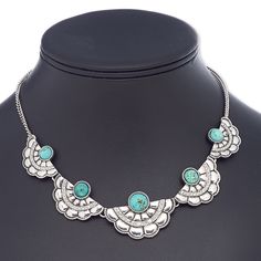 Ready-to-wear jewelry is great for counter sales or as a gift. This antique silver-plated steel and "pewter" necklace features a series of turquoise blue magnesite rounds and fan designs. Colors, shapes and sizes may vary in each lot. Bohemian Silver Necklaces With Patina, Bohemian Style Silver Necklaces With Patina, Bohemian Silver Necklace With Patina, Silver Metal Jewelry With Patina, Silver Patina Metal Jewelry, Vintage Silver Turquoise Necklace With Patina, Southwestern Silver Turquoise Necklace With Patina, Adjustable Southwestern Silver Turquoise Necklace, Handmade Metal Necklace With Turquoise Color