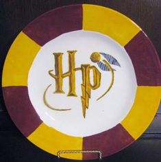 a harry potter plate with the letter h on it