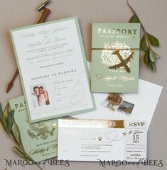 the wedding stationery is laid out on top of each other