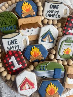 decorated cookies with camping theme on a plate