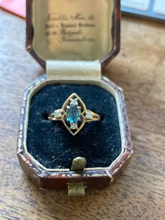 Vintage Genuine Spinel Ring from the 1970's  approx. .40ct Spinel approx. 6.5x4.5mm  Marked 375 inside the shank= 9k gold beautiful Navette design 4 surrounding stones do not test as genuine diamonds ...priced accordingly 2.8grams Size 7 . It is easily sized up or down by a skilled jeweler.  Excellent shape Blue spinel is a genuine gemstone that is associated with many metaphysical properties and symbolism, including: inner peace, truth, wisdom, intuition, calmness, protection, communication, an Vintage 14k Gold Sapphire Gemstone Ring, Vintage 14k Gold Sapphire Birthstone Ring, Vintage Oval Sapphire Birthstone Ring, Vintage Oval Sapphire Ring As Birthstone, Vintage 14k Gold Oval Sapphire Ring, Vintage Blue Cluster Ring With Center Stone, Vintage Oval Sapphire Ring In 14k Gold, Collectible Vintage Sapphire Ring, Blue Vintage Cluster Ring With Center Stone