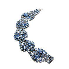 "Vintage Signed Kramer Rhinestone Bracelet (A1394) Size: 7.25\" Color: Blue Condition: Good vintage; one rhinestone is not soldered to the rest of the bracelet; look at close-up pictures. Era: Circa 1950s Signed: Kramer Please look at all the photos, as they are part of the description. I try my best to point out any flaws. Also please remember this is a preloved piece and may show signs of light wear, marks, scratches, etc. I will be posting a lot more jewelry, Keep checking back." Blue Crystal Bracelet With Rhinestones, Elegant Blue Bracelets With Rhinestones, Elegant Blue Rhinestone Bracelets, Bracelet Vintage, Close Up Pictures, Rhinestone Bracelet, Remember This, Chain Link Bracelet, Vintage Signs