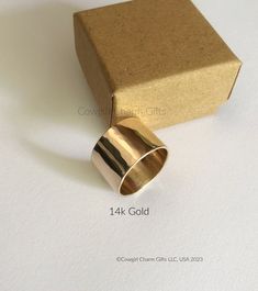 "This is a handcrafted solid 14k Gold ring with a beautiful textured finish. This wide ring is 1/2 inches wide with a quality thickness of 1.02! This ring has gorgeous appeal that is trendy, luxurious and fashionable.   This beautiful 14k solid gold ring makes a great gift and will last a lifetime.  This solid 14k Gold ring band has a quality thickness 1.02 mm. The ring comes with a shiny lightly textured finish that glistens in the light.  * If you would like a smooth finish please send a note 14k Gold Wide Band Ring For Promise Ring Event, 14k Gold Wide Band Ring For Promise, 14k Gold Wide Band Promise Ring, Yellow Gold Wide Band Promise Ring, Wide Band Promise Ring, Stamped 14k Gold Wide Band Ring, Rose Gold Wide Band Ring As Gift, Heirloom 14k Gold Wide Band Ring, Wide Band Jewelry Stamped 14k Gold