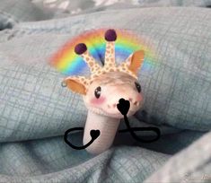 a toy giraffe with a stethoscope on it's head