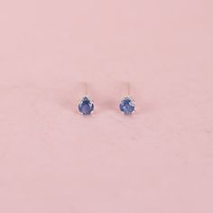 These tiny blue sapphire stud earrings are just perfect for a tiny bit of sparkle or for second piercings.  They feature recycled sterling silver posts and 2.5 mm genuine sapphire gemstones.  The post is centered on the back of the setting.  Reliable and effortless - exactly the kind of sparkle that I love to add to my day. Sapphire is the birthstone of September.  Made from responsible and recycled silver. Gemstone studs: https://www.etsy.com/shop/LotusStone?ref=seller-platform-mcnav&search_query=gemstone+studs Birthstone studs: https://www.etsy.com/shop/LotusStone?ref=seller-platform-mcnav&search_query=birthstone+studs Second piercing: https://www.etsy.com/shop/LotusStone?ref=seller-platform-mcnav&search_query=second+piercing Hoops to Pair: https://www.etsy.com/shop/LotusStone?ref=seller Small Sapphire Earrings, Second Piercings, Blue Sapphire Earrings, Blue Sapphire Studs, Sapphire Stud Earrings, Second Piercing, Sapphire Earrings Studs, Peoria Az