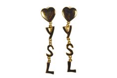 Vintage YVES SAINT LAURENT, made in France, gold plated logo initials heart dangle clip-on earrings. Signed on the back. Ref.: JA0102 CONDITION: Excellent DIMENSIONS: 2x9 cm More vintage items in my online shop: http://www.vintagecarwen.com France Logo, Vintage Hermes Scarf, Saint Laurent Vintage, Pearl Logo, Vintage Yves Saint Laurent, Ear Weights, Vintage Hermes, Heart Dangle Earrings, Heart Brooch