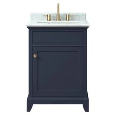 a bathroom vanity with a marble top and gold faucets on the sink cabinet