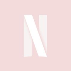 the letter n is made up of white rectangles on a pale pink background