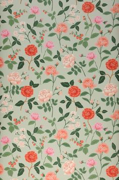 a floral wallpaper with pink flowers and green leaves