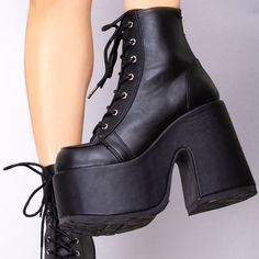 They’ll Get Out Of Your Way In The Here For Trouble Plafrom Boots From Demonia. These Bada$$ Festival Boots Feature A Vegan Leather Upper, Lace Up Front, Ultra Platform, And Zipper Closure Up The Back. Being Bad Never Looked So Good. - 5" (127mm) Chunky Heel - 3" (75mm) Platform - Lace-Up Ankle Boot - Metal Back Zip Closure Medium Width Lace-up Boots With Reinforced Heel, High Ankle Lace-up Boots With Platform, Leather Lace-up Platform Boots, Chunky Platform Lace-up Boots, Fall Platform Lace-up Boots With Closed Toe, Fall Closed Toe Platform Lace-up Boots, Lace-up Platform Boots With Reinforced Heel, Fall Lace-up Boots With Platform And Closed Toe, Edgy Lace-up Boots With Platform And Round Toe