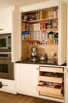 the kitchen is clean and ready to be used as a storage area for baking supplies