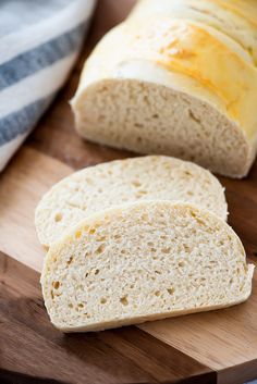 two loaves of bread on a cutting board