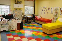 a brightly colored room with lots of furniture