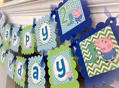 pep the pig birthday banner hanging from a mantle