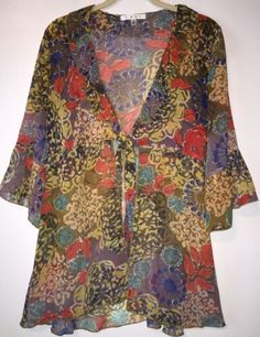 CAbi Shakespeare Tunic Semi Sheer Ruffle Top Tie Floral 360 Blouse Small XS | eBay Multicolor Ruffled Tops For Daywear, Fitted Multicolor Blouse For Daywear, Multicolor Summer Party Blouse, Summer Multicolor Party Blouse, Multicolor Summer Blouse For Party, Vintage Flowy Blouse For The Beach, Multicolor Summer Blouse For Daywear, Multicolor Summer Daywear Blouse, Summer Multicolor Daywear Blouse