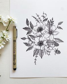 an ink drawing of flowers on paper next to a pen and flower pot with white flowers