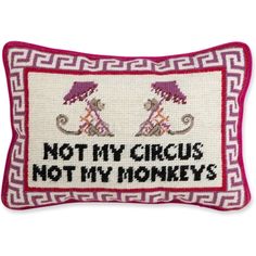 a cross stitch pillow that says not my circus, not my monkeys