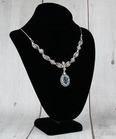 "Our gift to you, this lovely and gorgeous necklace for the loved one in your life. This sterling silver necklace features filigree style pendant and a sky blue topaz  gemstone attached at the center with dangling stone. This is not just an accessory, it's your next best gift giving option that has lasting memories attached to it. This double side faceted, checkerboard oval shaped amethyst, alexandrite, aqua chalcedony, sky blue topaz, black rutile, blue quartz or cherry quartz gemstone necklace is sure to last a lifetime!  This elegant and striking 925 sterling silver handmade filigree pendant necklace comes in beautiful sky blue topaz gemstone. Created by a filigree art professional and handmade with carefully. This is the perfect shined accessory for women. The pendant length is 1.60\" Silver Blue Topaz Necklaces For Wedding, Turquoise Necklace With Intricate Design For Gift, Silver Blue Topaz Necklace For Wedding, Elegant Turquoise Filigree Jewelry, Silver Blue Topaz Oval Pendant Necklace, Filigree Pendant Necklace, Cherry Quartz, Princess Necklace, Gemstone Pendant Necklace