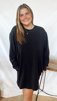 Stay cozy and stylish with The Sweater Dress! This black sweatshirt dress features convenient pockets for all your essentials. Perfect for a fun and simple look that will keep you warm and fashionable all day long. Model is wearing a Large Black Cozy Sweatshirt With Pockets, Cozy Black Sweatshirt With Pockets, Cozy Long Sleeve Sweatshirt With Side Pockets, Casual Crew Neck Sweatshirt Dress For Loungewear, Comfy Long Sleeve Black Sweatshirt, Comfy Black Long Sleeve Sweatshirt, Washed Black Long Sleeve Sweatshirt With Pockets, Casual Crew Neck Sweater Dress For Loungewear, Casual Black Sweatshirt Dress For Winter