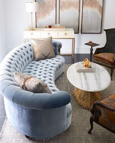 a living room filled with furniture and decor