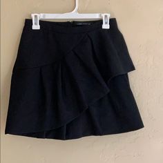 Zara Black Mini Ruffle Skirt. Brand New With Tag. Trendy Black Ruffled Skort, Black Ruffled Skirt For Date Night, Trendy Black Ruffled Mini Skirt, Black Tiered Skirt For Workwear, Black Tiered Skirt For Work, Black Ruffled Skirt Skort For Day Out, Black Ruffled Mini Skirt For Day Out, Black Ruffled Skort For Day Out, Chic Black Tiered Skort