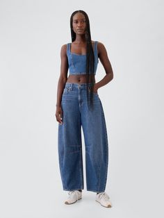 Fit:  An ankle-length horseshoe jean that's fitted at the waist with an exaggerated curved leg and tapered ankle.  Fabric: 95% Cotton, 5% Recycled Cotton.  Stretch: No Stretch Jeans.  Authentic denim that’s soft but rigid, drapey but holds its shape.  Rise: High Rise Jeans.  Look: A classic five-pocket horseshoe jean in a dark indigo wash.  Details: Zip fly, five-pocket styling & seams at sides.  Responsibly Made: This pair of jeans is part of our water-saving Washwell program.  Compared with co Nyc Fashion Fall, Horseshoe Jeans, Feminine Streetwear, Hot Weather Outfits, Corporate Fashion, Jeans Look, Ankle Length Jeans, Nightwear Women, Zara Fashion