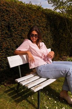 Pink embroidered short sleeve blouse that features a unique and trendy bow to tie on the front. This blouse does not offer lining but is not sheer - the perfect blouse to style up or down all spring and summer long. Our models also wear the Light Blue Maddie Jeans. Sizes: S-M / M-L S-M: Length 20.87 in - Width 18.50 in M-L: Length 21.65 in - Width 19.29 in 50 % cotton, 50 % polyester Washing: handwash Trendy Bows, Parisian Women, Perfect Blouse, Embroidered Shorts, Embroidered Blouse, Short Sleeve Blouse, Spring Summer Fashion, Sleeve Blouse, Summer Fashion