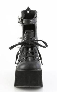 The Kera series features an impressive platform wedge across a range of styles to suit everyone who wants to tower over the competition. Vegan Black PU leather 4 1/2" Inch (114mm) Platform Lace-Up Front Ankle Boot Featuring Top Skull Buckle Strap & Metal Spike Stud Details Inner Side Metal Zip Closure U.S women's sizing-refer to size chart for more info Emo Boots, Demonia Boots, Demonia Shoes, Metal Spikes, Black Platform Boots, Patent Heels, Black Vegan, Platform Ankle Boots, Black Platform