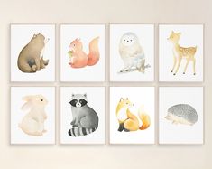 four pictures of animals are shown on the wall in this nursery art printable set