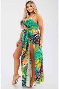 Tropical print maxi dress with attached shorts underneath Polyester - 95% Spandex - 5% Tropical Print Maxi Dress For Beach Season, Green Tropical Print Maxi Dress For Beach Season, Beachwear Maxi Dress With Tropical Print For Beach, Tropical Print Maxi Sundress For Beach Season, Tropical Print Maxi Dress For Beach Party, Tropical Printed Maxi Dress For Beach Party, Maxi Sundress With Tropical Print For Beach Season, Printed Green Maxi Dress For Beachwear, Flowy Tropical Print Maxi Dress For Beachwear