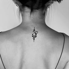 a woman with a tattoo on her back