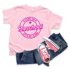 This is one hot item for this year’s first day back to school. This graphic shirt comes in florescent pink and white. This is offered from Preschool to Fifth Grade to represent the grade you may need. This is great for Teachers or Students. Get ready to make your first day back with this great fashion statement. Garment comes in three colors and a variety of sizes of your choice. We use high quality, soft flex vinyl which not only creates a sharp, vivid graphic but will never look "faded" or “wa Pink Short Sleeve T-shirt For College, Back To School T-shirt With Heat Transfer Vinyl, Pink T-shirt With Name Print For School, Pink Tops With Letter Print For School, College Pink Graphic Print T-shirt, Pink Short Sleeve T-shirt For School Events, Pink Graphic Print T-shirt For College, Pink Graphic Tee For College, Pink T-shirt For Back To School