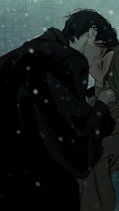 a man and woman are kissing in the snow while wearing black clothes with their arms around each other