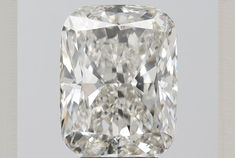 a cushion cut diamond is shown in this undrecognized image, which appears to be part of a jewelry collection