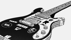 a black and white photo of an electric guitar