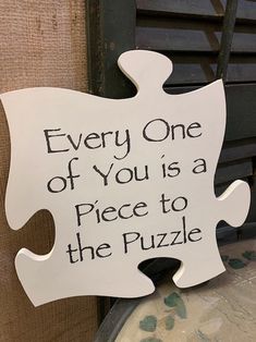 a sign that says every one of you is a piece to the puzzle