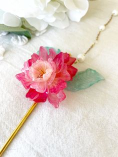 Flower Sakura Cherry Blossom Chinese Hair Pin  Flower Sakura Cherry Blossom Chinese Hair Pin comes with one handmade shrink plastic flower that is about 2 inches. Comes with two plastic flower buds. also comes with two shrink plastic leaves. And has a 7 inch tassel that is beaded. everything about this hair pin is handmade. inspired by traditional Chinese hair pins. Comes with one hair pin! -Hair pin length: 6 in -Hair Tassel length: 7 in weighs about 0.7 oz PLEASE NOTE:  please remember that ea Traditional Chinese Hair, Chinese Hair Pins, Sakura Flower Accessories, Cherry Blossom Hair Pin, Cherry Blossom Hair Clip, Chinese Hair Pin, Sakura Hair Pin, Plum Blossom Hairpin, Flower Sakura