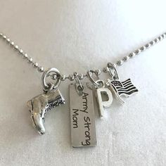 Necklace is made of sturdy 2.4mm Stainless Steel Ball Chain, which is very durable and will not tarnish. You select your necklace length from the drop-down menu.Army Strong Mom Charm is Stainless Steel and is Laser Engraved. Charm measures 25mm x 9mm.Combat Boot Charm is made of Pewter and measures approximately 12.5mm x 12.5mm x 7mm. Boot Charm, Air Force Mom, Marine Mom, Military Mom, Army Strong, Strong Mom, Army Mom, Accessory Ideas, Combat Boot