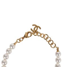 These Chanel CC denim heart and pearls bracelet features an adjustable faux white pearl chain with a CC blue enamel denim heart charm a gold tone hardware CC charm, and a lobster clasp.Origin: ItalyCondition: New and never wornAccompanied by: Box, felt jewelry cover, ribbon, carebook and retail UPC, Measurements: Length (circumference): 8" | Diameter: 2.5" ; 0.75" x 1" heart charm Luxury White Jewelry For Fashion Accessory, Luxury Adjustable Pearl Chain Bracelet, White Formal Jewelry With Logo Charm, Formal White Jewelry With Logo Charm, Classic Adjustable Jewelry With Logo Charm, Luxury White Bracelets With Adjustable Chain, Elegant Adjustable Jewelry With Logo Charm, Luxury White Bracelet With Adjustable Chain, Jewelry Cover