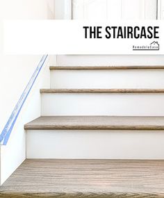 the stairs are painted white and have blue tape on them