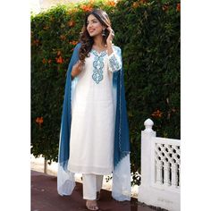 "Add a tint of lavish ethnicity to your look with this White Embroidered Cotton Suit Set. This three-piece set includes a Kurta with Pants and Dupatta. The White cotton kurta comes with all-over embroidery, a round neckline, 3/4th sleeves, and White cotton pants. The blue and White cotton dupatta comes with an attached lining. Size Chart Dupatta: Length- 2.5 mtr, Width- 36\" THESE ARE GARMENT MEASUREMENTS (IN INCHES)                 XSSMLXLXXL3XL Chest34363840424446 Waist30333537394143 Hip36384042444648 Shoulder13.51414.51515.515.516 Kurta Length48484848484848 Pants Length39393939393939" Semi-stitched Blue Lawn Suit With Embroidered Border, Blue Lawn Suit With Embroidered Border Straight Kurta, Blue Lawn Suit With Embroidered Border, White Bohemian Lawn Suit With Dupatta, Blue Anarkali Lawn Suit With Embroidered Border, White Cotton Dupatta, Tie Dye Dupatta, White Kurta Set, Shaded Dupatta