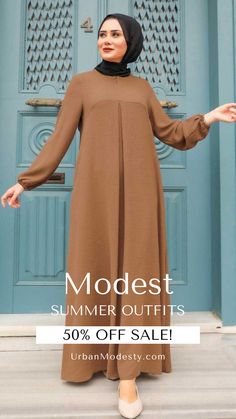 Discover the perfect blend of style and modesty with our collection of modest summer outfits. Embrace the latest trends in modest fashion, from flowing maxi dresses to chic abayas. Stay cool and comfortable while expressing your urban modesty with our selection of hijabs and trendy modest clothing. Elevate your summer wardrobe with our fashionable and versatile pieces that are designed to keep you feeling confident and stylish all season. Modest Embroidered Maxi Abaya, Modest Black Abaya With Long Sleeves, Modest Long Sleeve Embroidered Abaya, Fitted Long Sleeve Black Abaya, Modest Long Sleeve Black Abaya, Modest Clothing Women, Flowing Maxi Dress, Modest Outfits