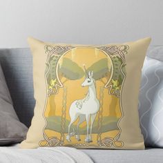 a white unicorn on a yellow background with an ornate frame and border around it throw pillow