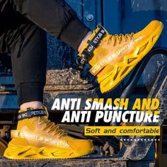 a person wearing yellow sneakers and black pants with the words, anti smash and anti puncture