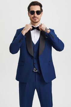 This one button tuxedo by Stacy Adams features a wide black satin shawl lapel, matching pants and vest. This comes in a hybrid fit (Sizes 34-44 = Slim Fit | Sizes 46+ = Modern Fit) Groom's Tuxedo With Notch Lapel And Single Button, Notch Lapel Single Button Tuxedo For Groom, Fitted Dapper Tuxedo For Parties, Blue Tuxedo Three-piece Suit, Single-breasted Tuxedo For Groom, Tailored Tuxedo Three-piece Suit With Single Button, Groom's Tailored Single Breasted Tuxedo, Groom's Tailored Single-breasted Tuxedo, Groom's Single-breasted Tailored Tuxedo